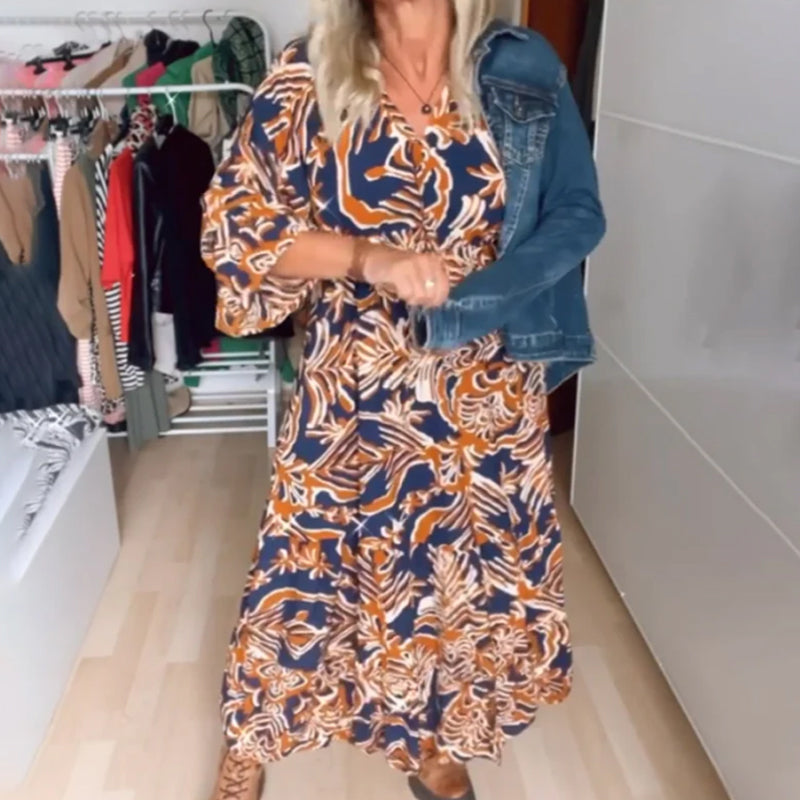 Vestido longo com estampa e decote em V