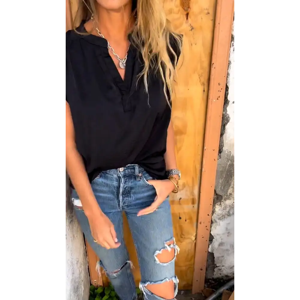 Blusa solto com mangas curtas e decote em V