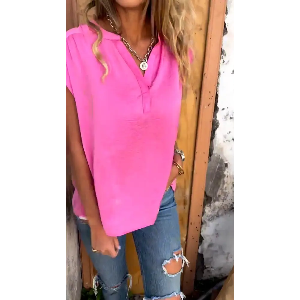 Blusa solto com mangas curtas e decote em V