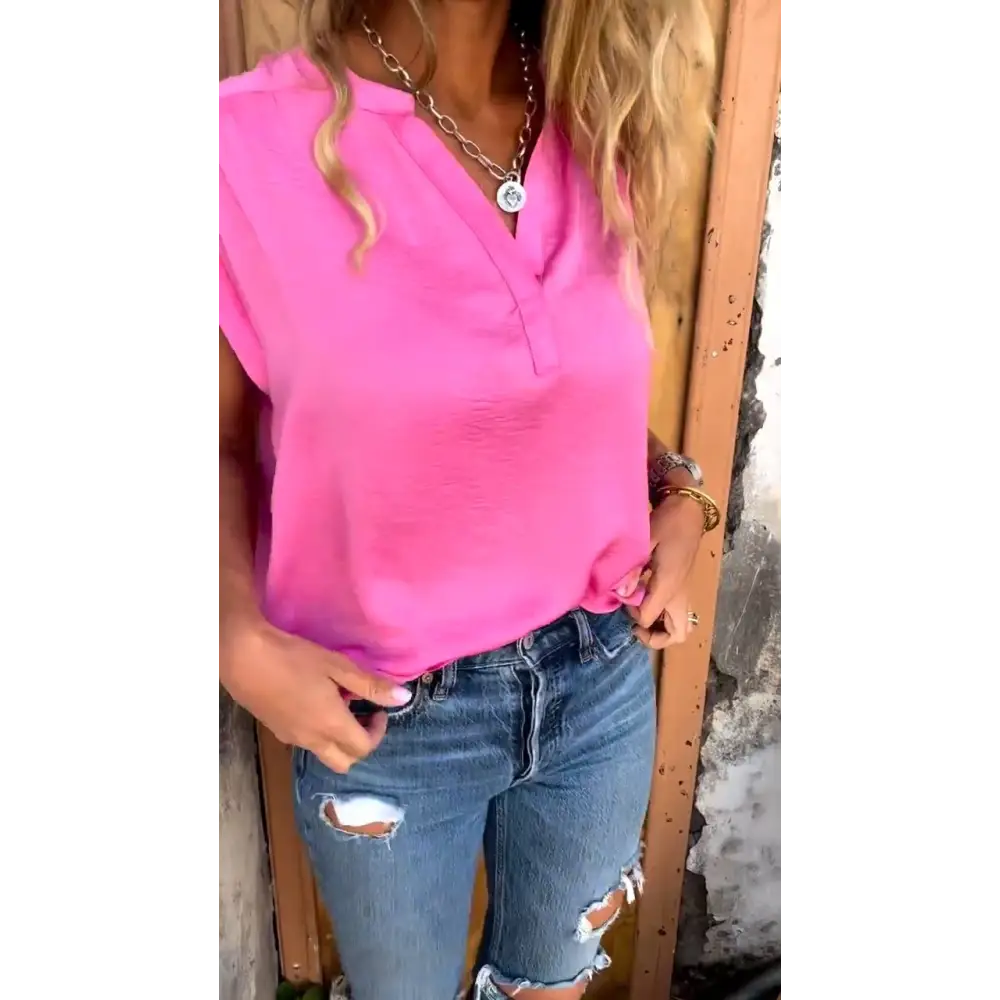 Blusa solto com mangas curtas e decote em V